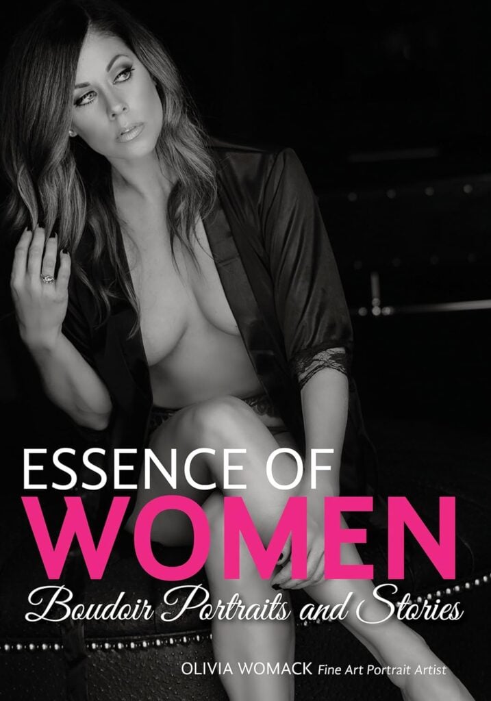 Book cover titled "essence of women - boudoir portraits and stories" by olivia womack, featuring a black and white photo of a woman posing thoughtfully in a dimly lit setting