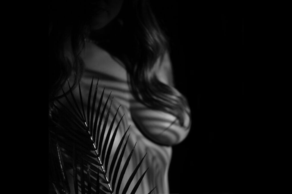 Black and white intimate portrait highlighting natural beauty and elegance by Olivia Womack Photography