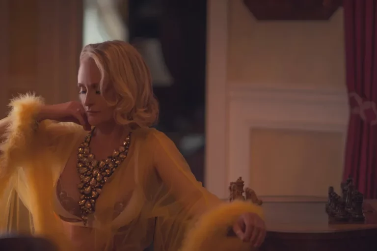 Woman in yellow dress with golden necklace