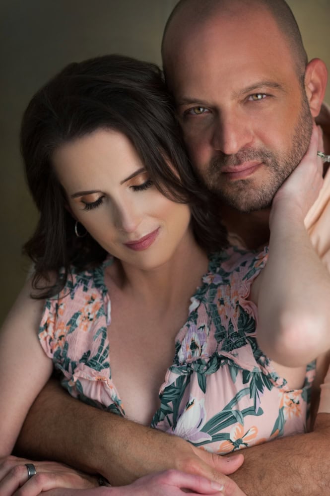 Couple embracing, close-up, soft focus