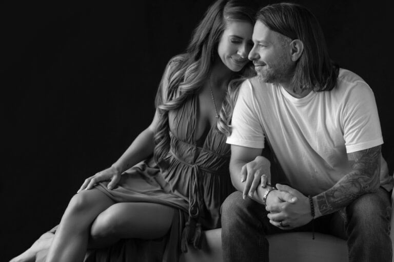 Affectionate couple smiling in a black and white photo